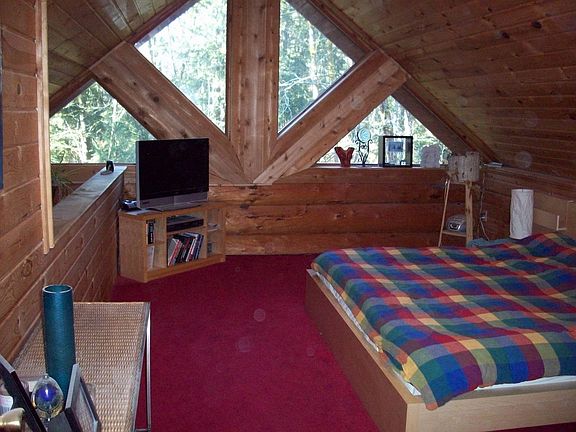loft bedroom with lg window