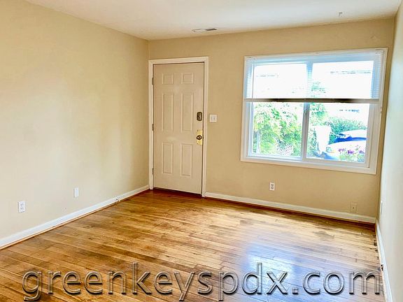 Large double-paned window with new blinds