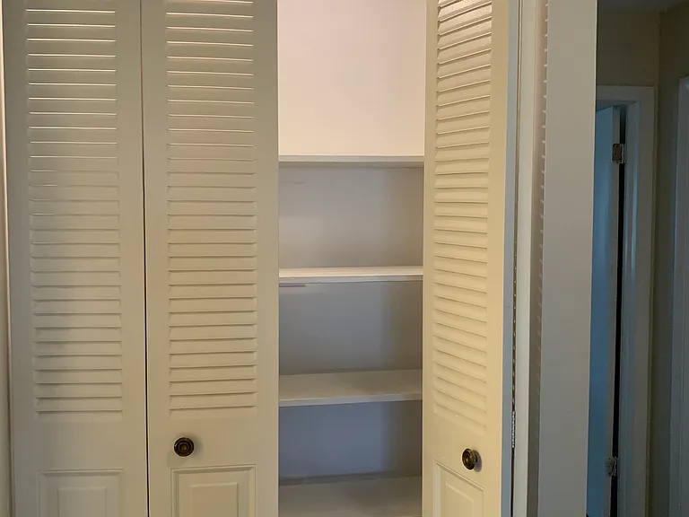 Hallway Closet w/ Shelves