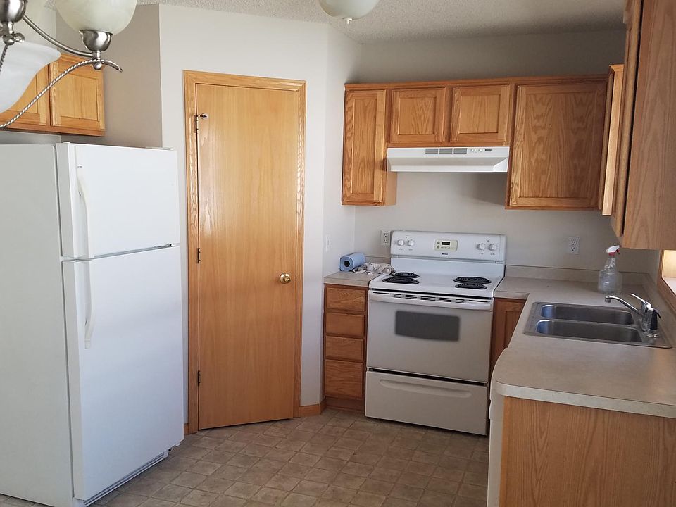 Kitchen with large pantry, dishwasher and large refrigerator