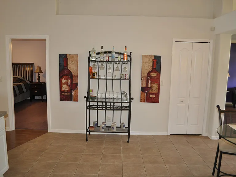 Pantry and wine rack next to Master bedroom