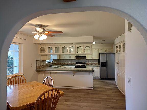 Serving counter, lots of cabinets.