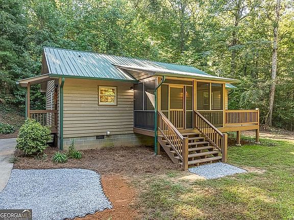 Front View of Screened in Porch and Grilling deck