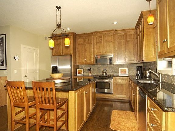 granite, stainless, maple shaker cabinets