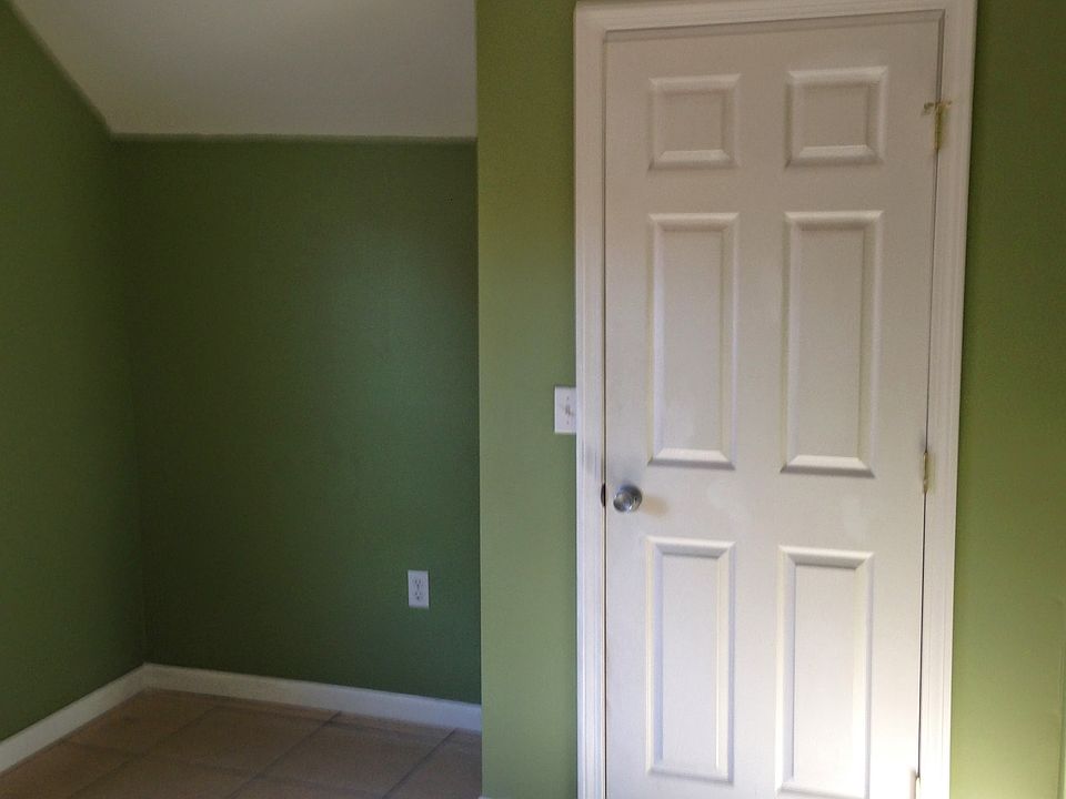 Bedroom #1 with vaulted ceiling and closet