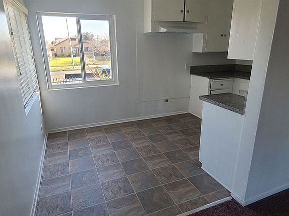 2nd image of 10107 S Hoover St #11713964