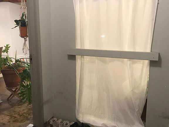 Mud room, leaving street and entering apartment.