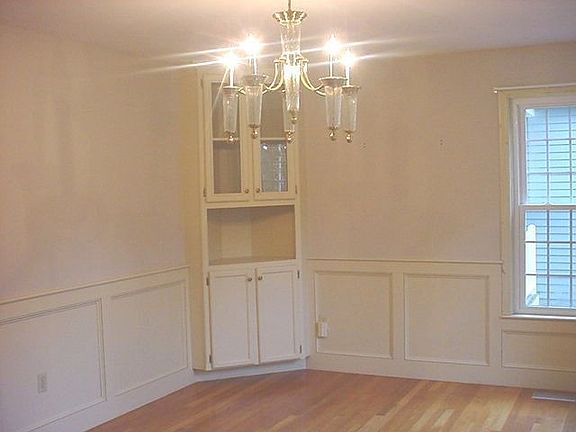 Spacious dining room with builtins