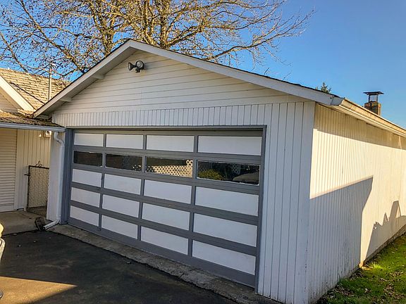 500 sq. ft. garage with wood stove.