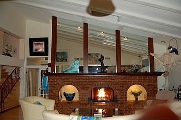 Feel the Wamr Glow of the Triple Fireplace