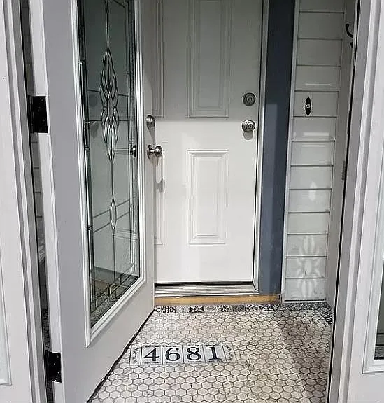 Custom mosaic tile inside the porch.