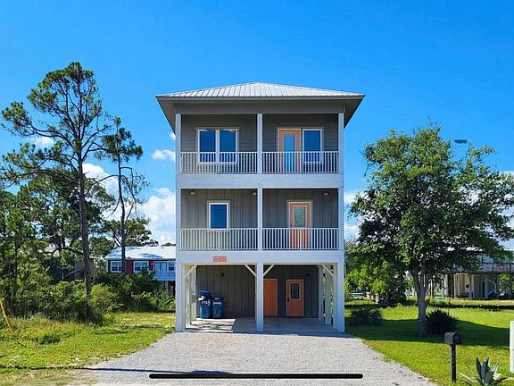 Front of house with parking