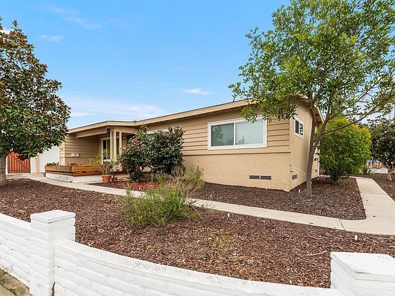 Great front yard with a double garage, driveway and street parking.