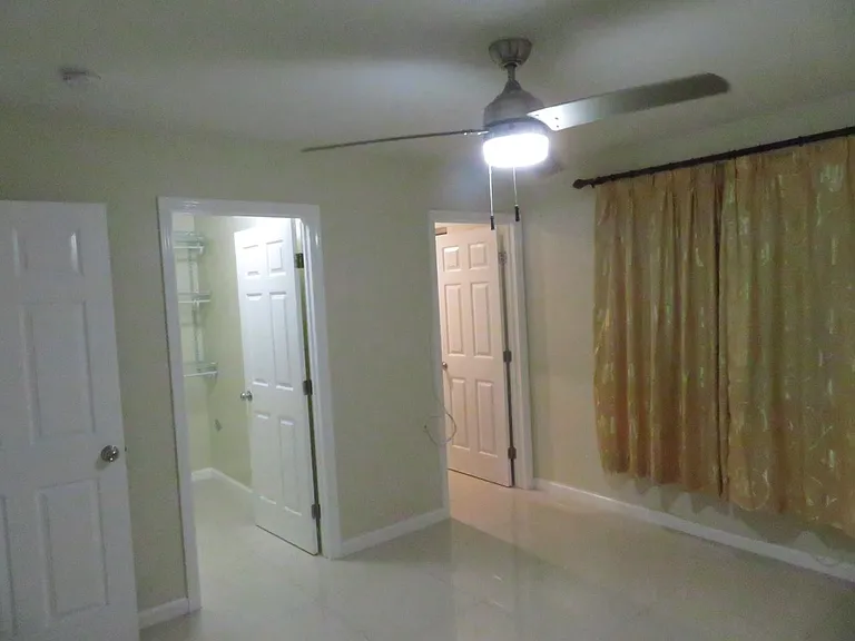 Master bedroom. 1st door is to walk-in closet. Second is to mater bath.