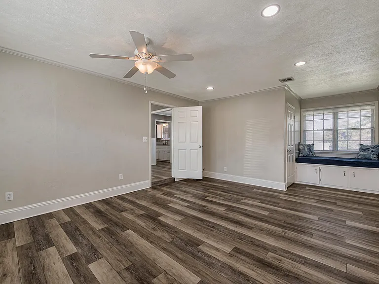 This room could be used for the Master Bedroom or Den. It has it own Bathroom, Washer/Dryer connections, double closets and bay window