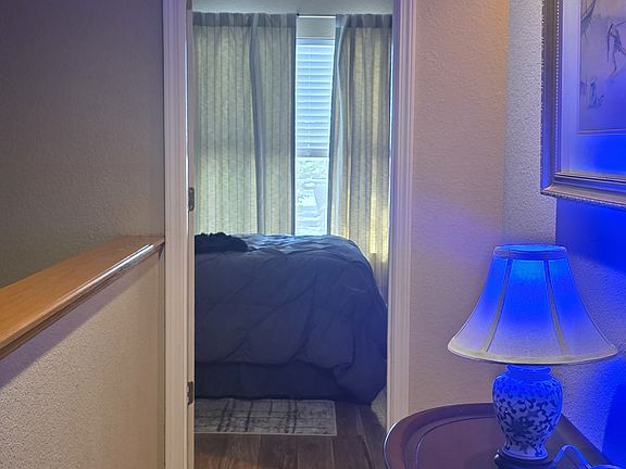 The upstairs hallway also with newer wood laminate flooring facing the bedroom that we have for rent.