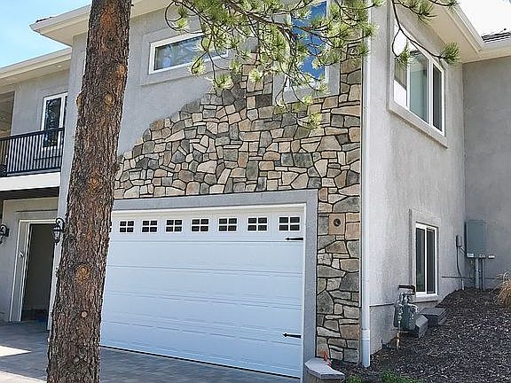 North end w/ part of garage