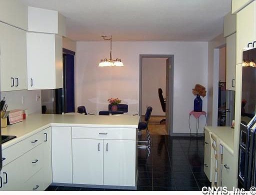 Spacious Kitchen w/Breakfast Bar & Built In Desk