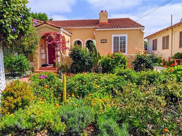 House color is Spanish gold, not orange. Looking. Beautiful frontage.