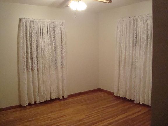 We had a king size bed, 2 big dresser, and huge wall unit in this room! 3 bedrooms on main level each have Bi-folding closet doors expose closet with double shelf. Ceiling fan w/light in all upstairs bedrooms. Beautiful hard wood floors