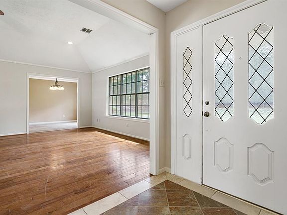 Enter this charming home with view of living room.