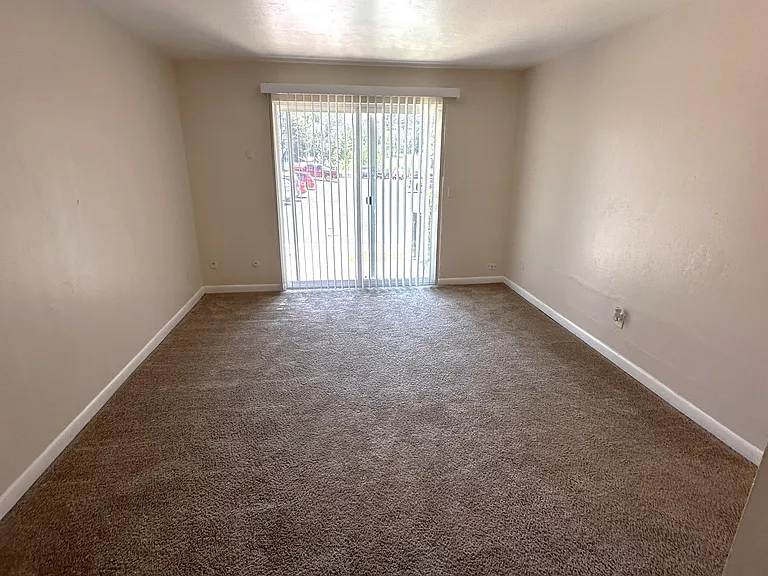 Living Room with sliding glass door to Patio