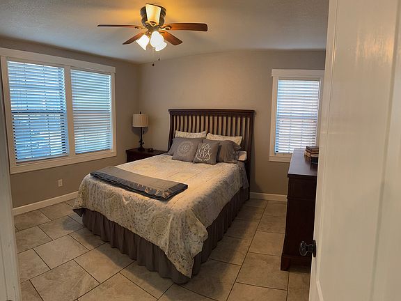 Main bedroom with luxury queen-size bed.