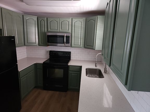 NEW FRIDGE, QUARTZ COUNTERTOPS, DEEP SINK, AND DRAINING RACK