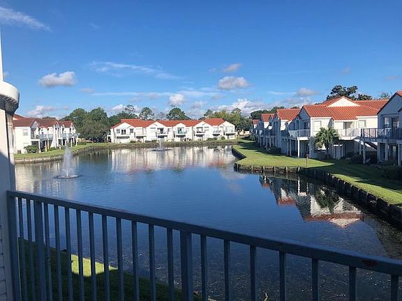Beautiful water view from balcony and living-dining room