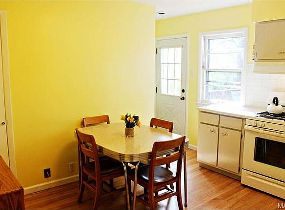 Another view of kitchen. Pantry on Left and Backdoor to Deck on