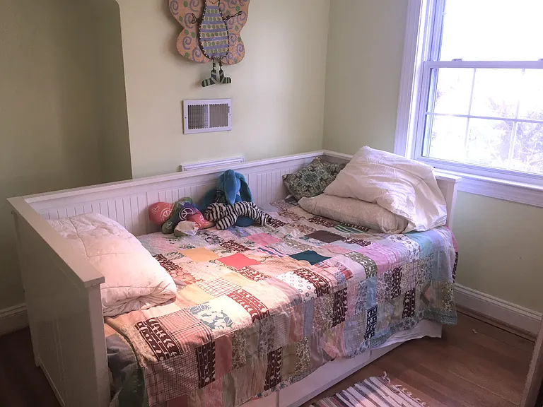 View of back side of 25 foot long Bedroom with 2nd bed for child
(Could divide room to split back into original 2 bedrooms).