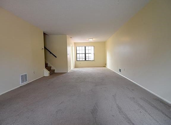 View of living-room & dining area as you enter the townhouse