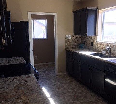 Kitchen, into Laundry