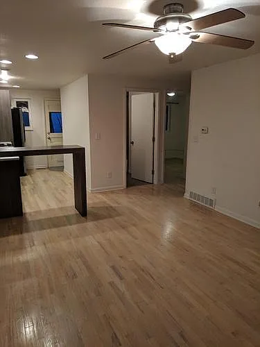 Front Door Looking In, Through Living Room into Kitchen
