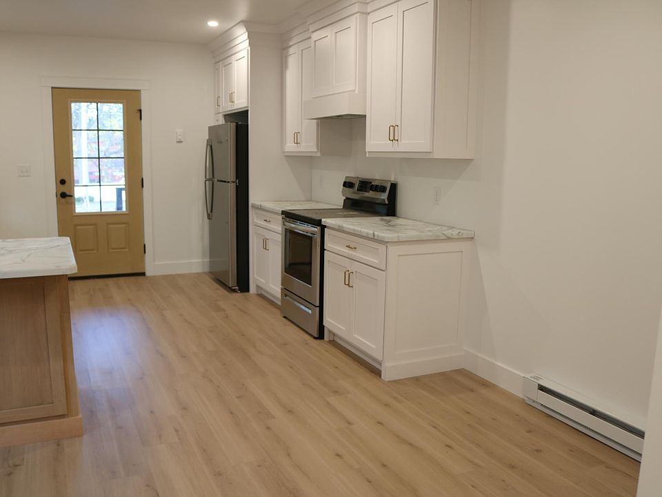 Lots of light with view to back deck/ yard