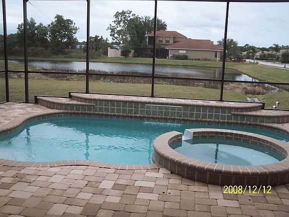 Salt Water pool, spa, waterfall with lake view