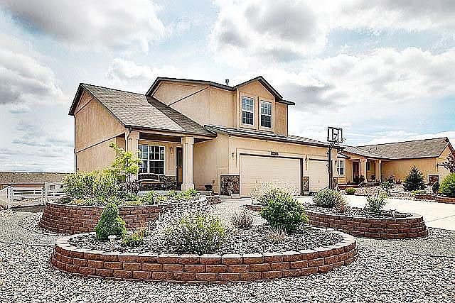 Spacious newer Woodmen Hills home in immaculate condition.