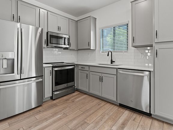 Kitchen with stainless steel appliances