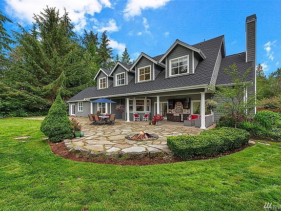 The rear of the home, with ample space for enjoying the outdoors and entertaining.
