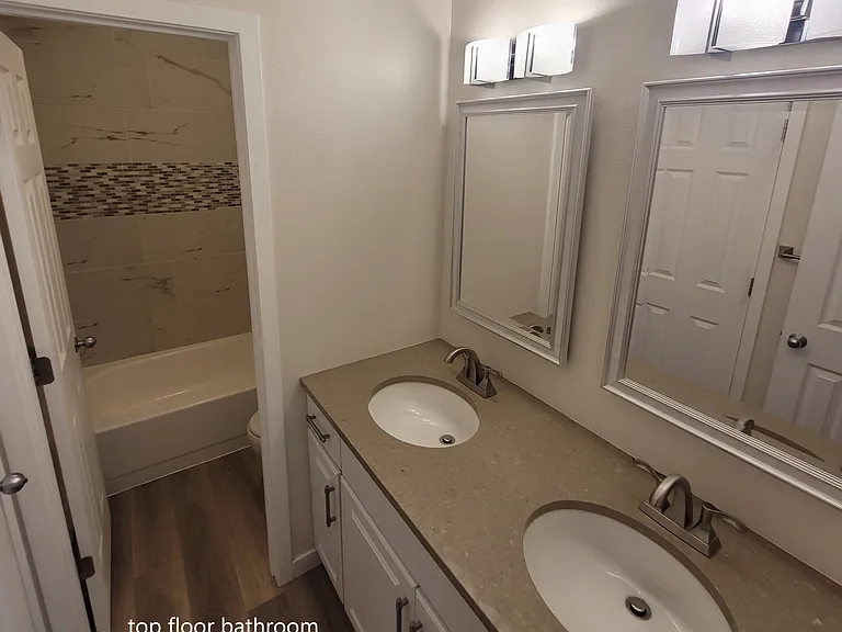 top floor bathroom dual vanity area