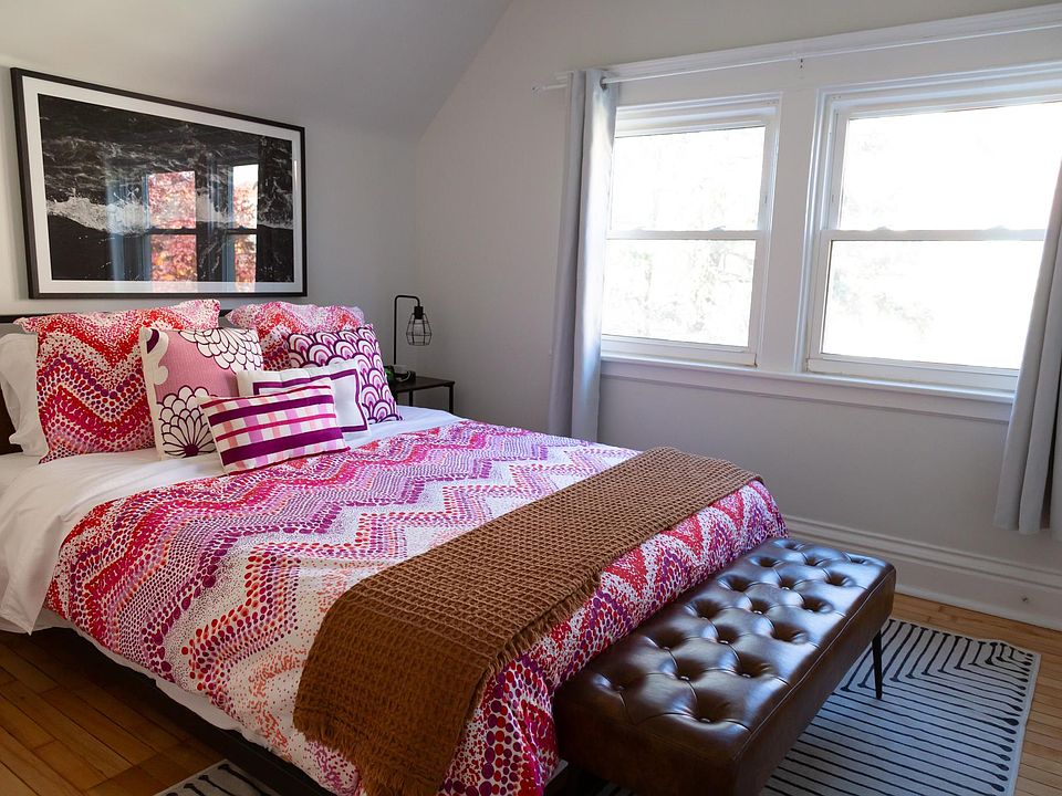 Primary bedroom with walk-in closet