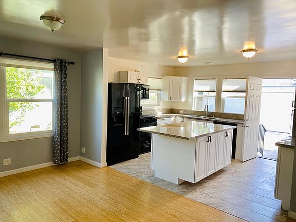 Huge open concept kitchen/dining area. Lots of natural light.