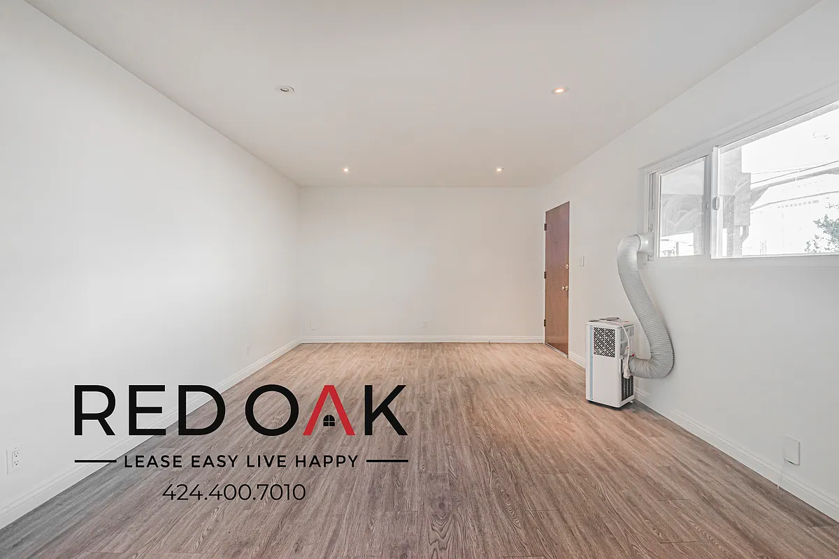 Building Photo - 1303 W 25th St #2