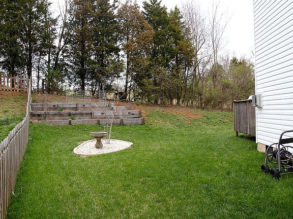 Side yard, garden, rock bed