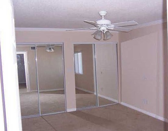 Double closets in 15 x 11 Master bedroom