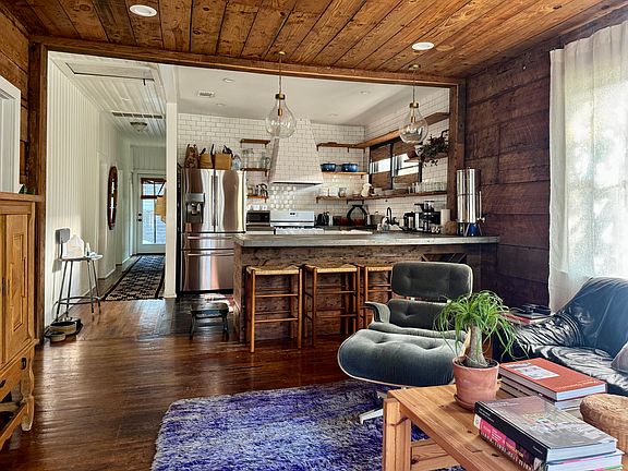 Appreciate the details in the
shiplap walls, modern updates,
and abundant natural light filling
the main living areas.