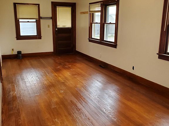 LR with view of the front door - and access to the front covered porch.