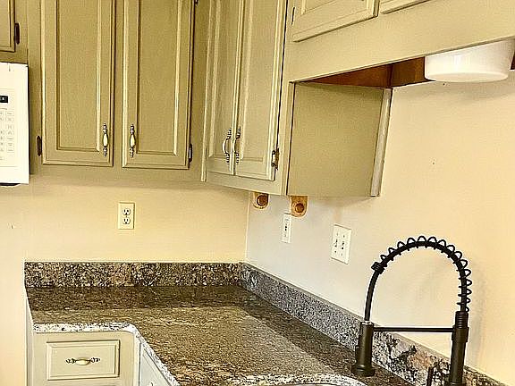 New granite and faucets