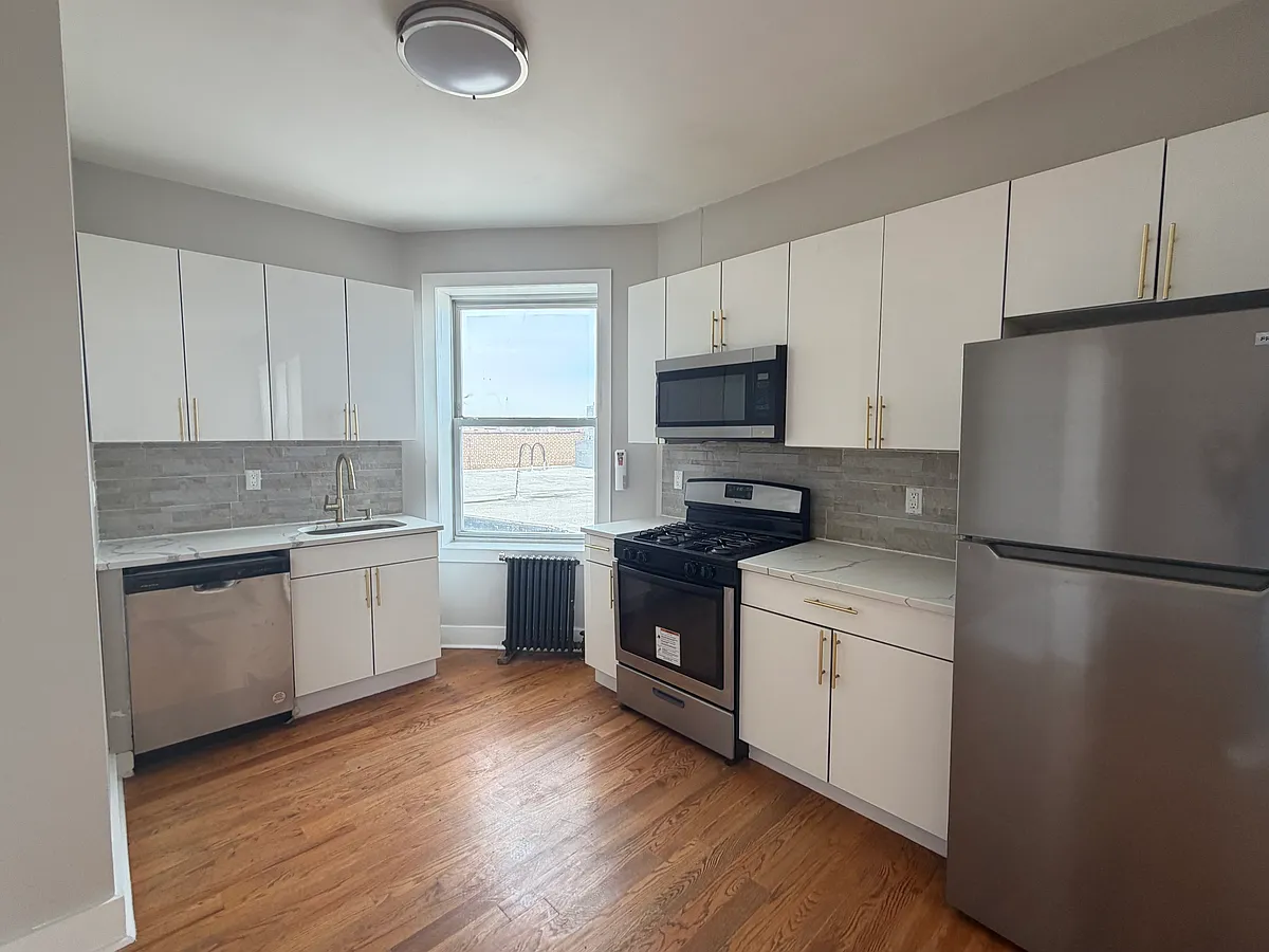 Building Photo - 6000-02 Monroe Pl #14B