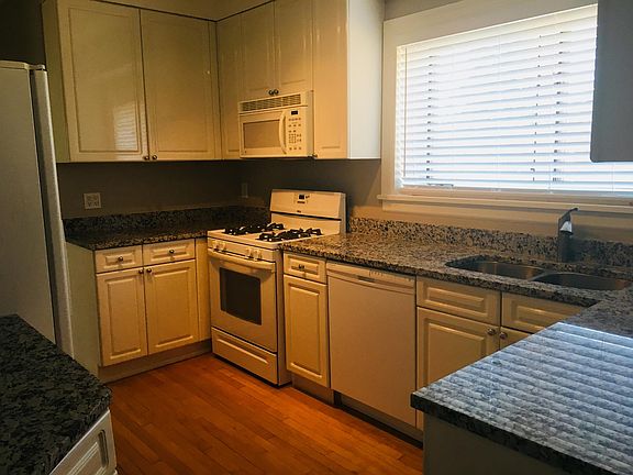 Granite Counters, Dishwasher, Microwave and Disposal.